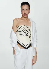 Pantalón de lino blanco, de corte recto, con cintura elástica y lazo de ajuste.