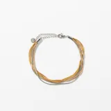 Pulsera de múltiples hilos finos en plateado, dorado y cobre, con cierre de mosquetón y cadena de alargue.