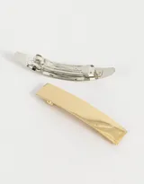 Set de dos hebillas francesas metálicas, una plateada y otra dorada.