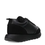 Zapatillas deportivas negras con detalles en gamuza y cuero sintético.