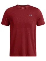 Remera deportiva gris jaspeado de corte clásico, con cuello redondo y mangas cortas. Confeccionada con tejido de punto transpirable y tecnología seamless para mayor comodidad.