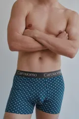 Boxer ajustado a rayas verticales azul marino y blancas, con cintura elástica gris con el logo de la marca Carouomo.