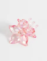 Broche para el pelo con forma de flor holográfica color rosa claro.