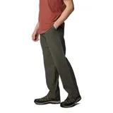 Pantalón de hombre color azul marino, de corte recto, con bolsillos laterales, bolsillos de seguridad con cierre y bolsillo para cuchillo. Confeccionado en tejido elástico con tecnología Omni-Shade UPF 50.