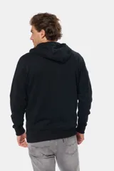 Canguro con cierre y capucha color bordó, confeccionado en felpa de algodón y poliéster.