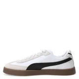 Championes Puma Club II Era, color negro con detalles en blanco y suela marrón.