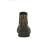 Botín Chelsea CAT Footwear Hardwear, color negro, con elástico lateral y tirador trasero amarillo. Suela chunky con plataforma y dibujo dentado.