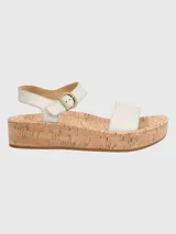 Sandalias con plataforma de corcho y tiras de cuero color plateado.