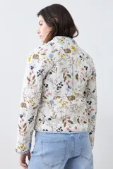 Chaqueta capitoneada reversible con estampado floral multicolor y ribete azul.