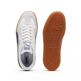 Championes Puma Army Trainer blancos con detalles en negro y gamuza gris. Suela de goma color caramelo.