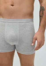 Pack de dos bóxers largos, uno blanco y otro negro, confeccionados en algodón y elastano, con cintura elástica personalizada.