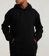 Hoodie masculino de algodón con felpa, color azul marino, de corte relaxed, con capucha ajustable, bolsillo canguro y manga larga.