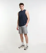 Musculosa deportiva amarilla de poliéster con tecnología dry, cuello redondo y estampado jacquard.