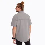 Camisa de manga corta azul con bolsillo en el pecho con cierre de cremallera y botón.