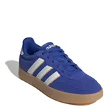 Championes urbanos Adidas Barreda, color azul con detalles en blanco y amarillo.