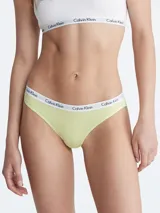 Bombacha clásica color amarillo pastel, con cintura elástica blanca con el logo de Calvin Klein repetido.