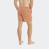 Short de baño liso color celeste, con cintura elastizada y cordón ajustable.