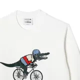 Buzo blanco de algodón con cuello redondo, puños y cintura acanalados. Estampado frontal con el logo de Lacoste y un cocodrilo vestido con ropa de ciclista andando en bicicleta.