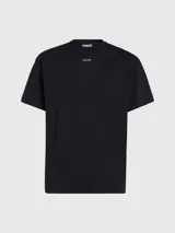 Remera negra de algodón con cuello redondo, mangas cortas y logo Calvin Klein nano en el pecho.