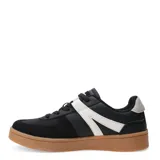 Zapatillas deportivas negras con detalles en blanco y suela color caramelo.