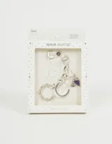 Set de seis aros bañados en plata, incluye dos cuffs, un aro pasante con amatista y tres argollas, una con dije de ojo turco y otra con dije de cuerno.