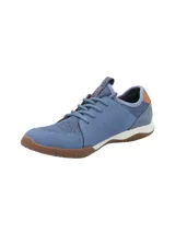 Championes Hush Puppies modelo Space, color celeste con detalles en marrón y suela marrón. Capellada de cuero con cuello de lycra y planta con tecnología GreenFoam® en base a caña de azúcar.
