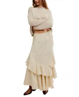 Falda larga color verde oliva con estampado floral jacquard, corte asimétrico y volantes en cascada.