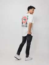 Remera rosa de algodón con estampado frontal y trasero con el texto "Rusty Sun Ocean Tribe".