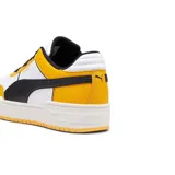 Championes Puma CA Pro Sport, color blanco con detalles en amarillo y negro. Zapatillas de estilo urbano con suela de plataforma.