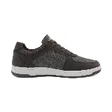 Championes urbanos grises de tela y cuero sintético, con cordones y suela blanca.