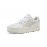 Championes Puma Court Lally Skye de cuero blanco con detalles en beige y suela de plataforma.