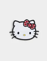 Pin metálico esmaltado con diseño de Hello Kitty con moño rojo a lunares blancos.