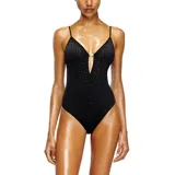 Body negro de microfibra con escote en V profundo y tirantes finos. Presenta apliques de pequeños cristales o tachas plateadas distribuidos en el área del busto y un detalle metálico en forma de anillo ovalado en el centro del escote.