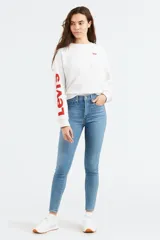 Pantalones de jean de tiro alto, corte super skinny y color celeste claro.