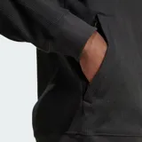Buzo Adidas Essentials negro de corte clásico, cuello alto con cierre de medio largo, bolsillo tipo canguro y logo bordado en el pecho.