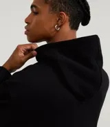 Hoodie masculino de algodón con felpa, color azul marino, de corte relaxed, con capucha ajustable, bolsillo canguro y manga larga.