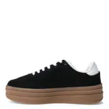 Championes urbanos color beige con plataforma marrón.