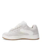 Zapatillas deportivas negras con detalles en blanco, suela blanca y base marrón.