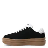 Zapatillas deportivas negras con detalles blancos y suela de goma color caramelo con plataforma.