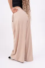 Pantalón negro de lino con corte wide leg.