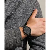 Reloj Skagen Signatur con caja de acero inoxidable negra de 40mm y malla metálica negra de 20mm. Esfera negra con acabado sandblast y cristal mineral. Resistente al agua 3 ATM.