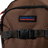 Mochila marrón de 33 litros con logo Rip Curl en el frente y correas ajustables.