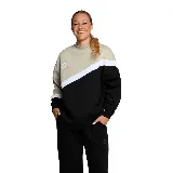Buzo de dama Umbro Lyra color beige, negro y blanco, con cuello alto y logo estampado en el pecho.