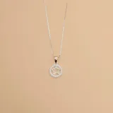 Conjunto de collar y dije de estrella en plata 925 con circonias.