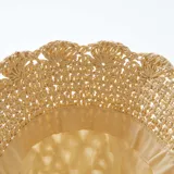 Gorro tipo bucket color beige, tejido a crochet con diseño calado.