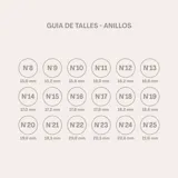 Anillo en plata 925 con forma de V invertida, con circonias engarzadas en la parte inferior.