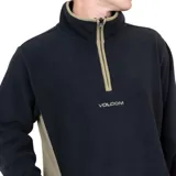 Canguro negro de micropolar con cierre parcial y logo Volcom estampado en el pecho.