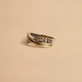 Anillo trenzado en plata 925 y oro 9k.