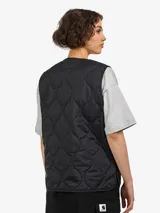 Chaleco negro Carhartt WIP W' Skyler con costuras y textura puffer. Borde tonal en el cuello en V, cierre de botón a presión tonal en la abertura frontal, bolsillo de parche del mismo tejido en el pecho izquierdo y 2 bolsillos de parche del mismo tejido en la parte delantera inferior.