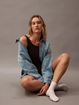 Body negro Calvin Klein Shapewear, de corte ajustado, con escote redondo en la espalda, copas suaves sin relleno, control de vientre y paneles diseñados en la cintura, la cadera y la parte trasera.